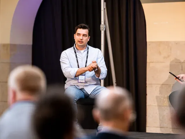 Denis Turkov on a panel at Technology at Scale